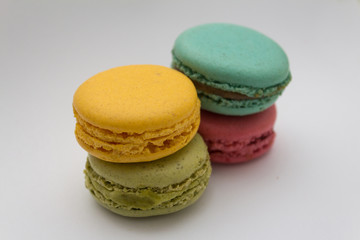 colored macarons. stacked macaroons.