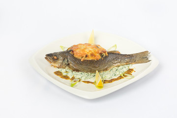 Fried fish on white plate