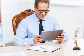 Professional lawyer sitting at the table 