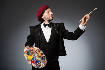 Funny artist working in the studio