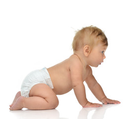 6 month infant child baby toddler sitting or crawling looking at