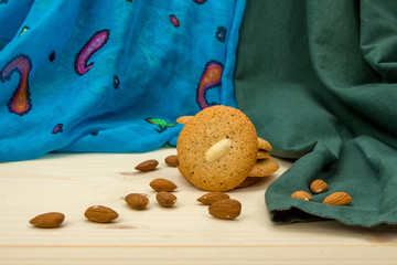 Homemade macaroons round on wooden table, front view