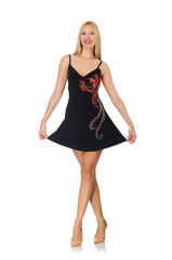 Tall young woman in black dress isolated on white