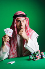 Arab man playing in the casino