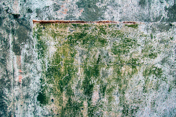 Texture of grunge wall surface.Old wall covered with cracks and peeling paint
