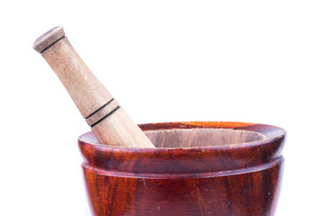 wooden mortar and pestle isolated on white background