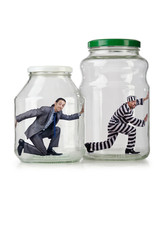 People trapped in the glass jar