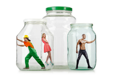 People trapped in the glass jar