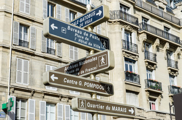 Street sign with directions in Paris