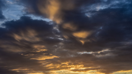 Naklejka na ściany i meble Sunset sky with clouds