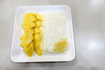 Thai style dessert, sticky rice eat with mangoes