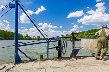 Working on ferry boat.