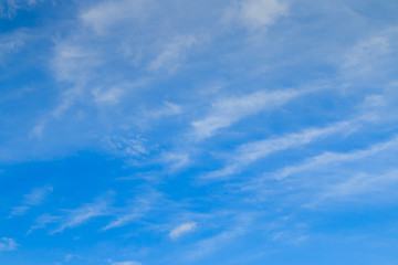 Obraz premium Blue sky with tiny clouds