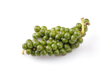 green color black pepper on white background