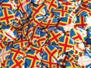Background with round pins with flag of aland islands