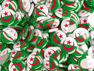 Background with round pins with flag of algeria