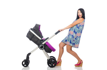Happy mom with her baby in pram 
