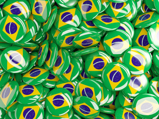 Naklejka premium Background with round pins with flag of brazil