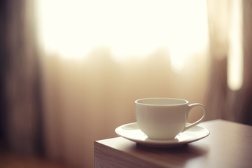 cup of coffee on blurred background
