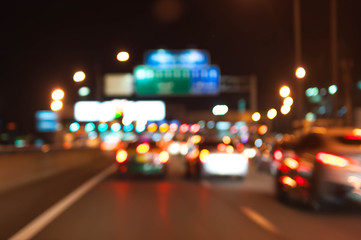 Fototapeta na wymiar Evening traffic. The city lights. Motion blur. Abstract background.