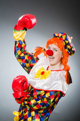 Funny clown in comical concept