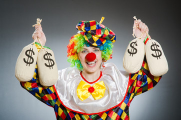 Funny clown in comical concept
