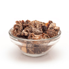 Front view of Organic Dried gooseberry or Amla (Ribes grossularia) in glass bowl isolated on white background.