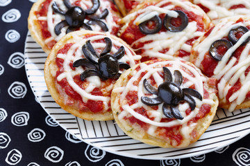 Mini pizzas decorated for a Halloween