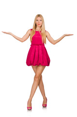 Young woman in pink dress isolated on white