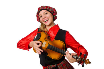 Funny woman in scottish clothing with violin