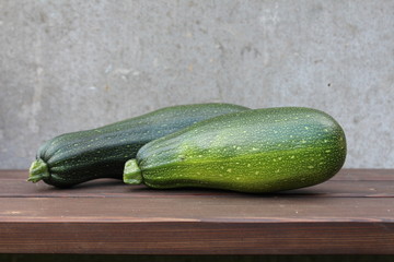A harvesting time. Two vegetable marrows.
