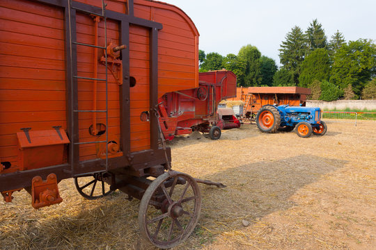 Old tractor and farm wagon, agriculture, rural life