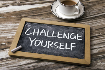 challenge yourself handwritten on blackboard