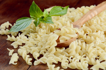 Raw fusilli pasta background