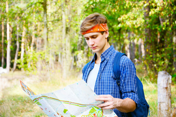 Young man is exploring the map