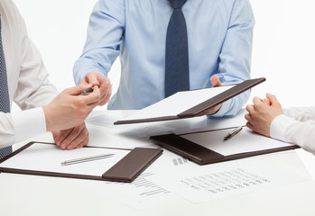 Business people holding documents