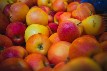 Red apples at a market stall. Close up.
