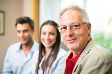 People at work in their office