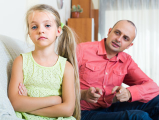 Annoyed father and frustrated daughter