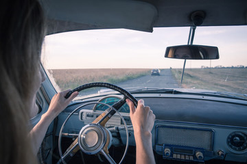 girl in retro car
