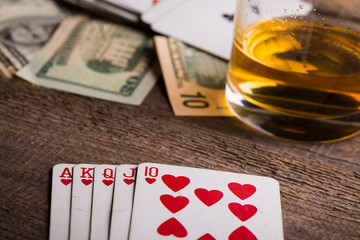 cards, whisky and money