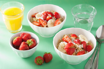 healthy breakfast quinoa with strawberry banana coconut flakes