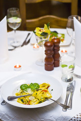 Pappardelle (wide ribbon pasta) with chilli pepper and pine nuts