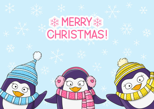Cute penguins on snow background 