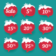 Winter sale labels in form of speech snow bubbles 