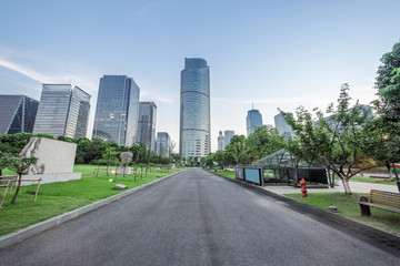 Fototapeta na wymiar asphalt road of a modern city with skyscrapers