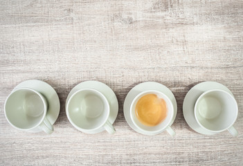 Coffee cups on the table, top view.