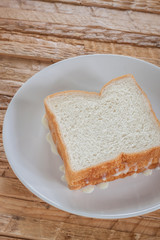 vintage cup of fresh milk bread with butter
