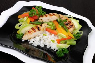 Rice with slices of chicken breast