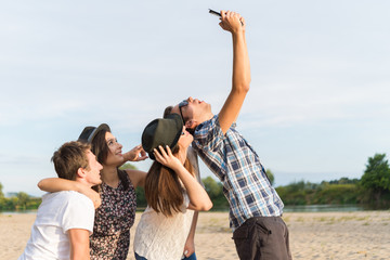 Group Of Young Adult Friends Taking Selfie